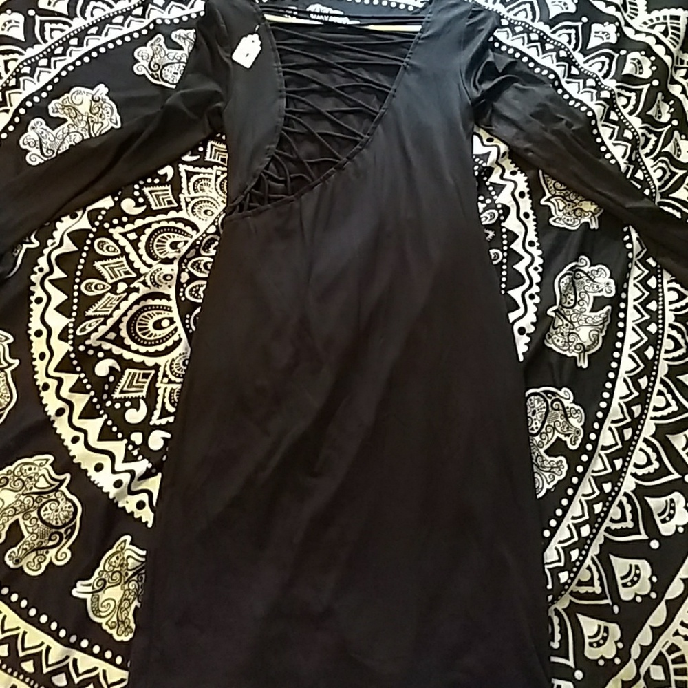 Black open back body con dress